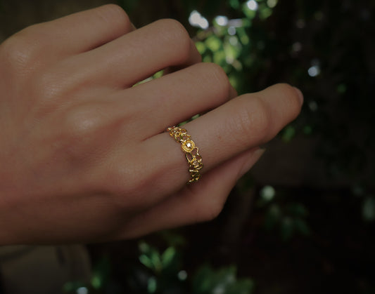 Whirl Of Diamonds Ring — worn alone on a hand outdoors.