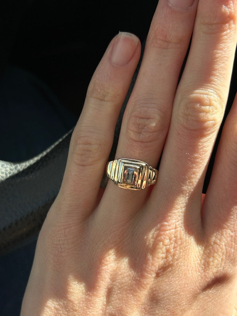 Custom ring worn on the hand