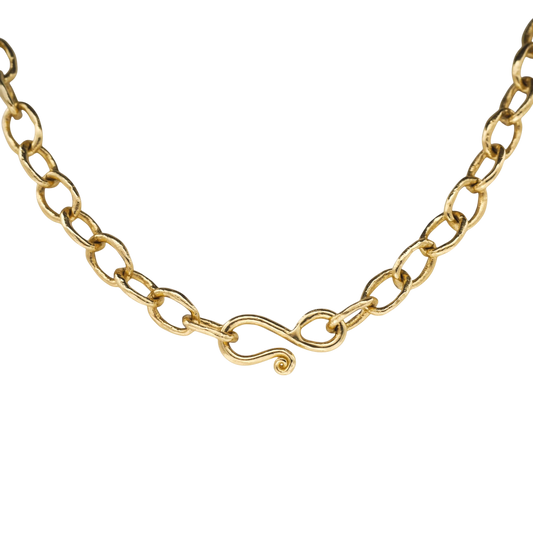 Gold Chain — An irregular yellow-gold chain alternates open oval links and closes with a scrolling hook.