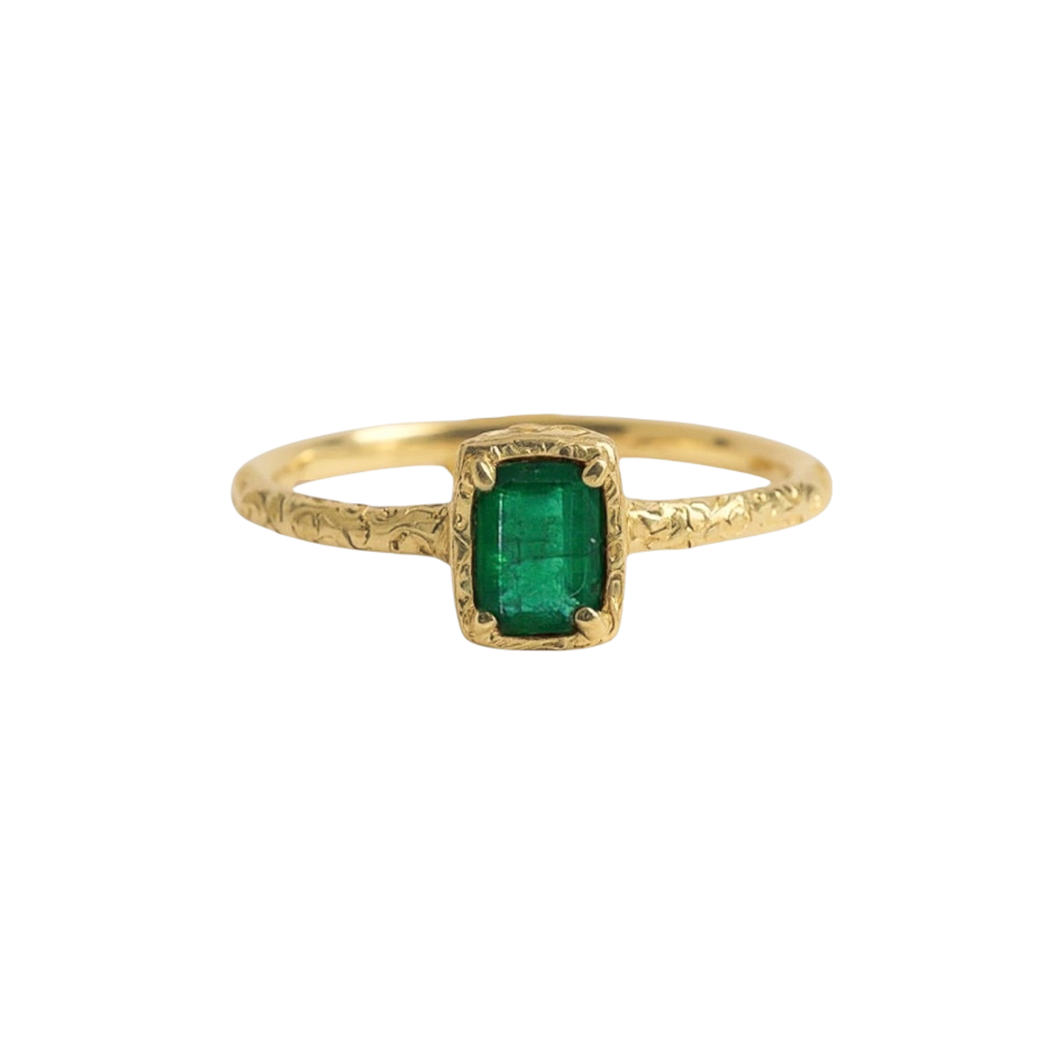 Emerald Script Ring — A rectangular green emerald is held by four prongs above a slender, scrolling yellow-gold-colored band.