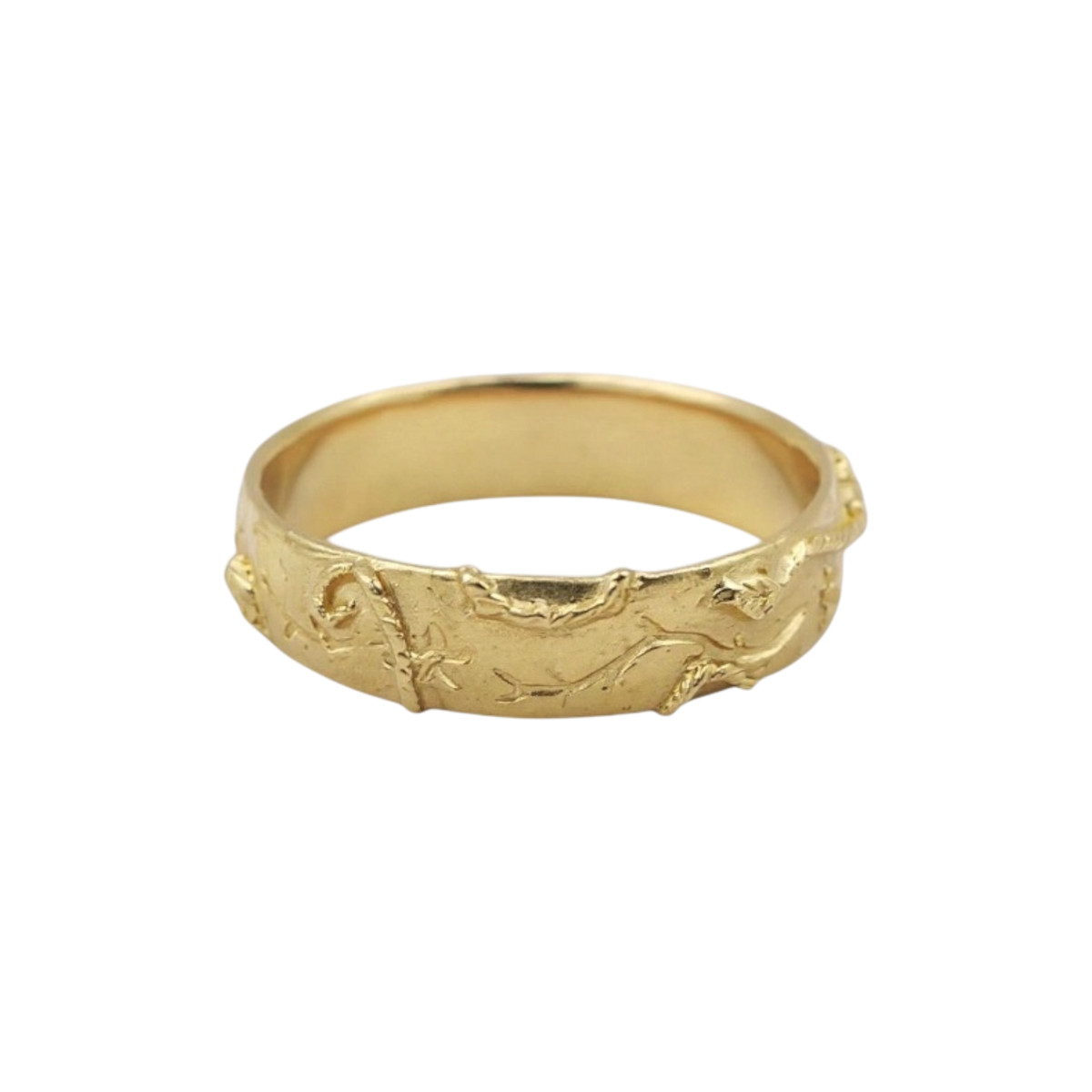 Gold Evergreen Ring — A wide yellow-gold-colored band is covered with raised branch and foliage relief.