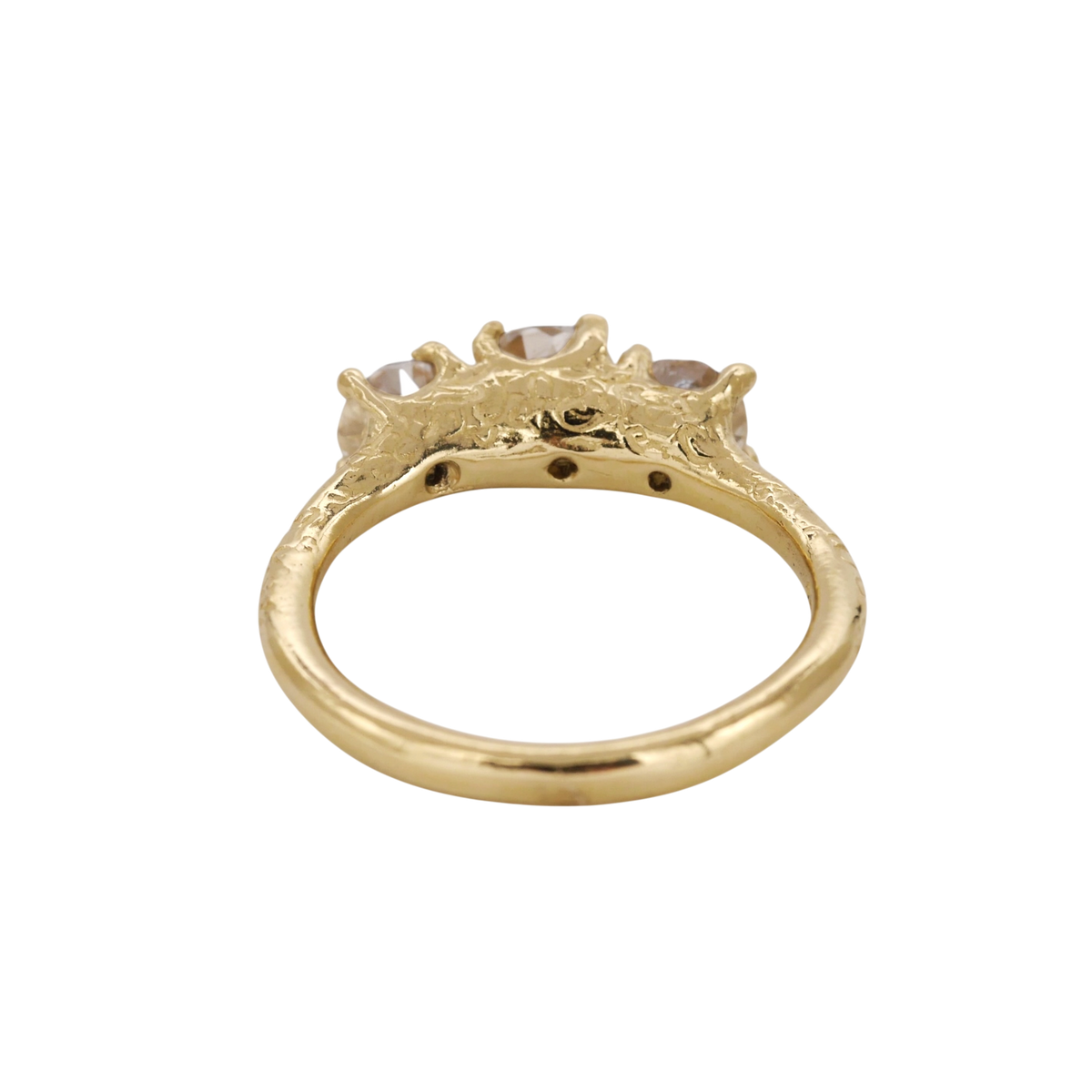 Gathering Ring — rear view showing the open setting beneath the three diamonds.