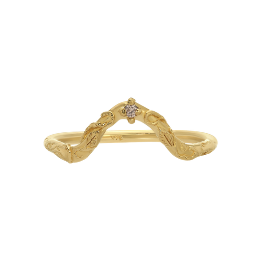 Daphnis Wedding Band — A curved yellow-gold-colored band traces a leafy vine around one small prong-set colorless round stone.