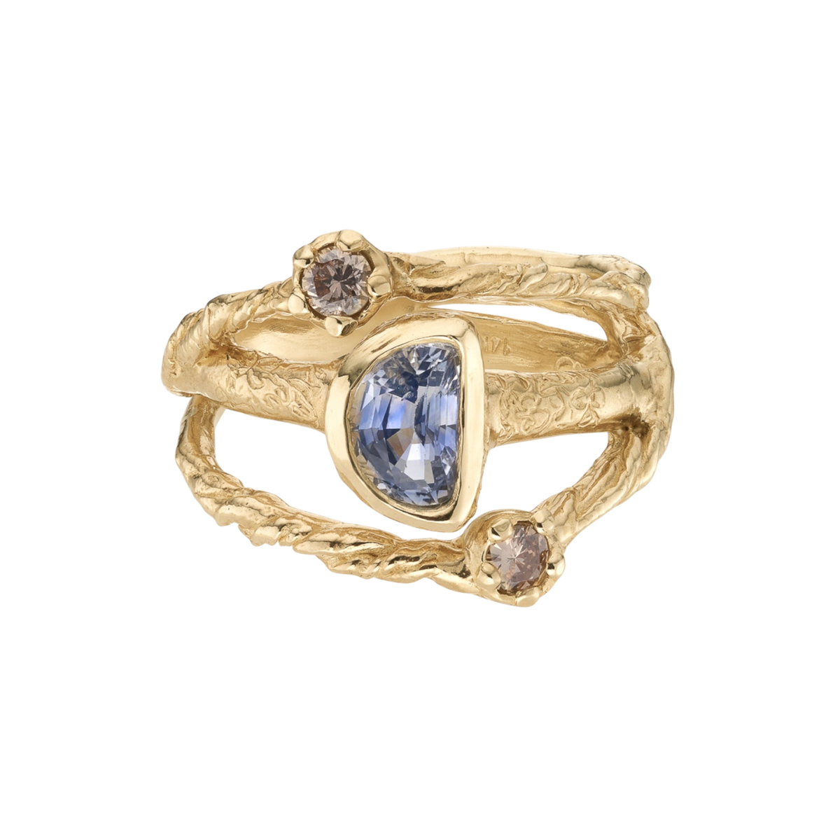 In Orbit Art Ring — An open yellow-gold-colored statement ring orbits one blue-violet asymmetric pear stone with two champagne round stones.