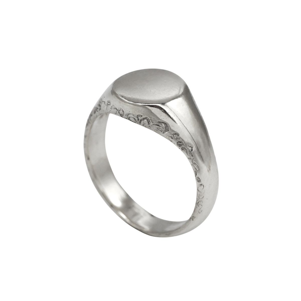 Scribe Signet Ring Silver — side profile showing the smooth signet face and engraved silver shank.
