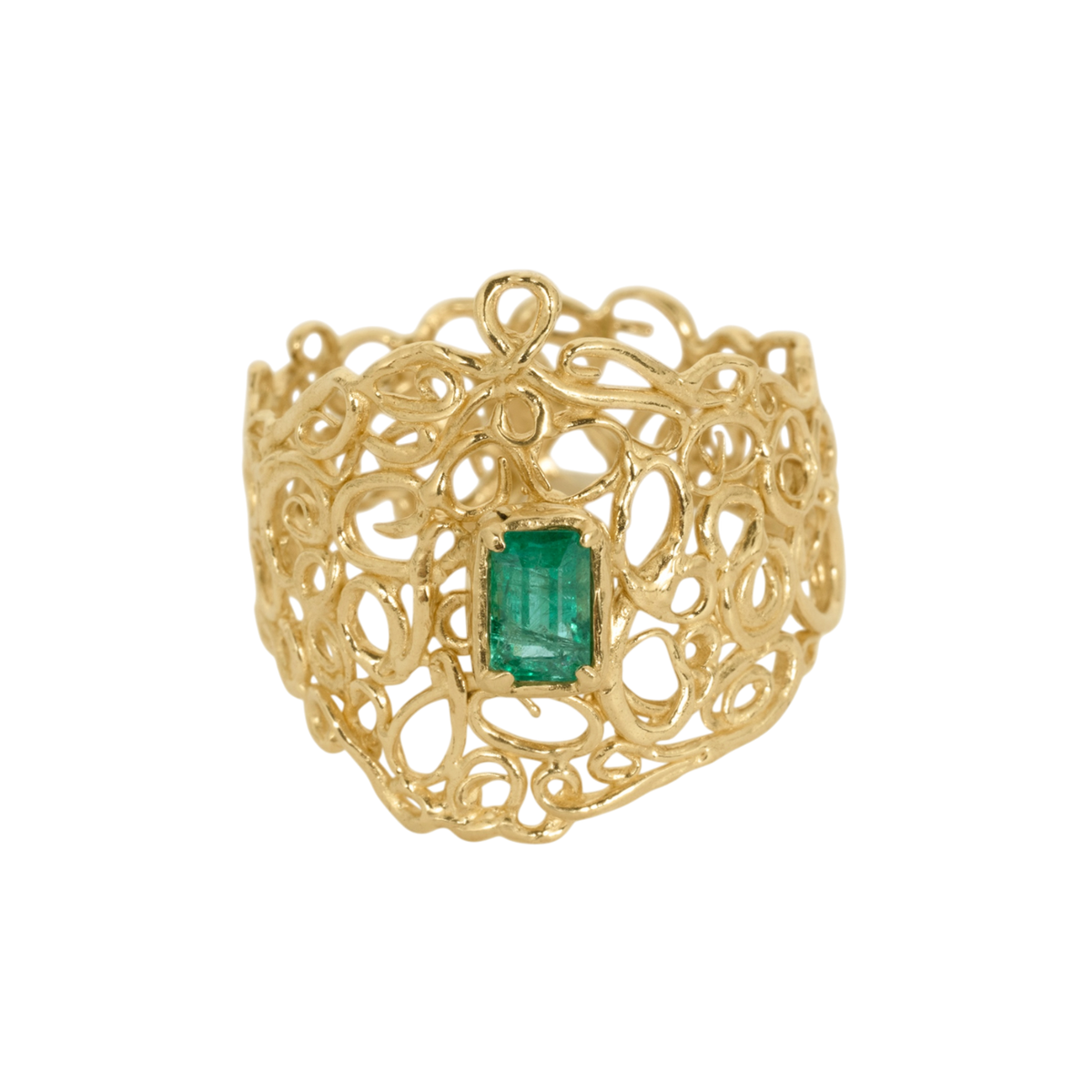 Utopia Ring — A green emerald-cut emerald is prong-set at the center of a wide yellow-gold-colored ring built from polished open scrollwork.