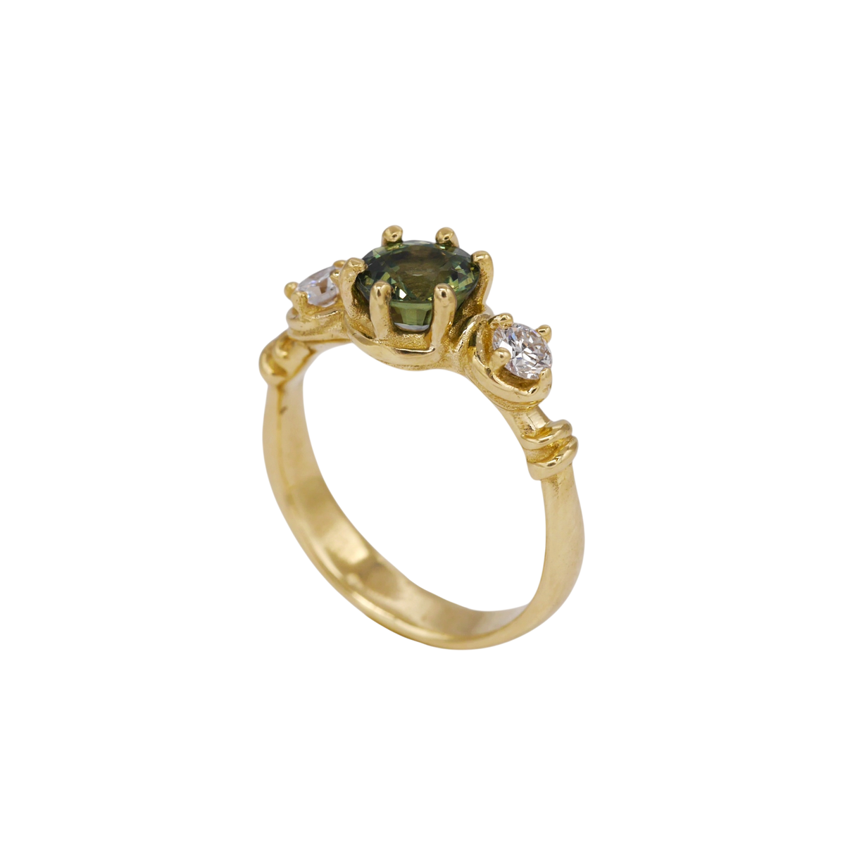 Verdant Ring — side profile showing the raised sapphire and flanking diamonds.