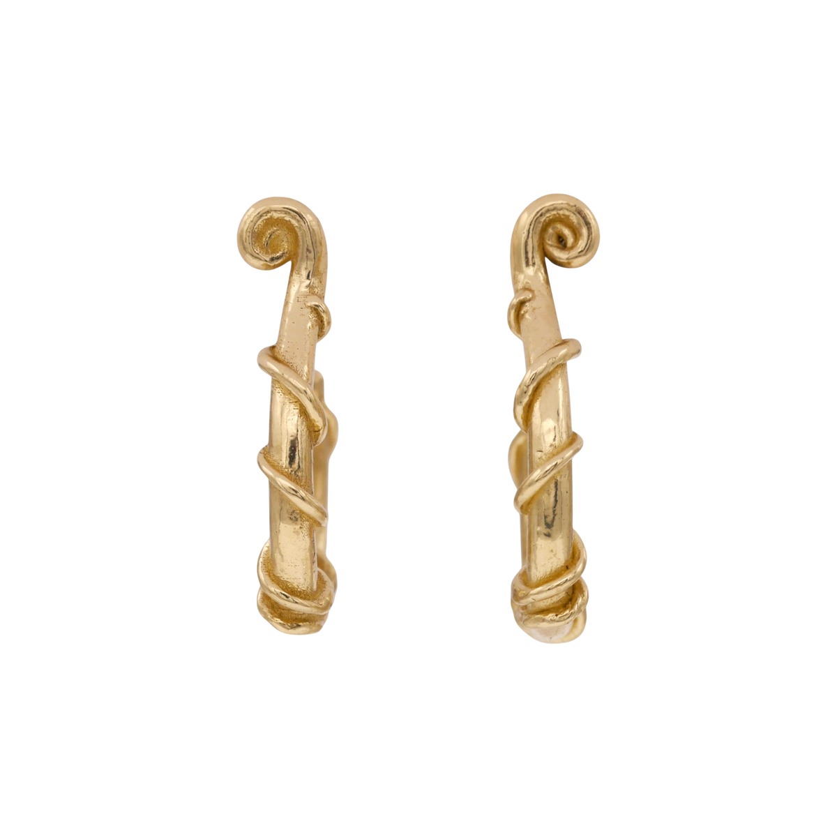 Vinekeeper Hoops — Yellow-gold open hoops are shaped like curved branches wrapped with raised vines and finished with spiral terminals.