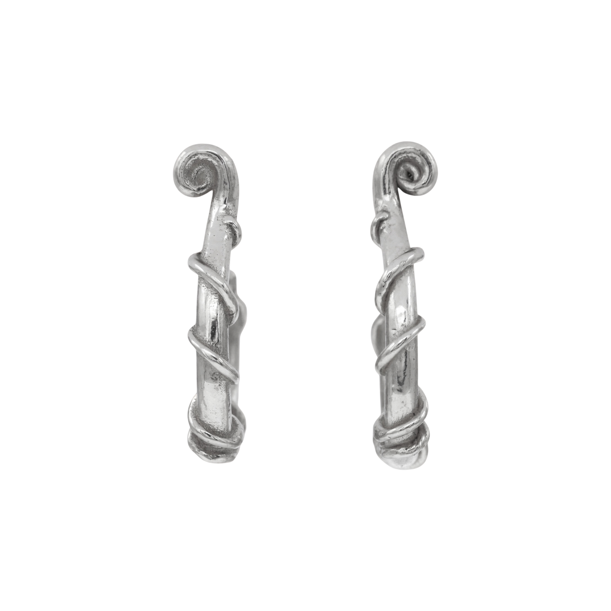 Vinekeeper Hoops Silver — Sterling-silver open hoops are shaped like curved branches wrapped with raised vines and finished with spiral terminals.