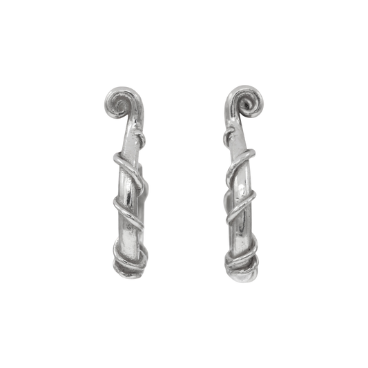 Vinekeeper Hoops Silver — Sterling-silver open hoops are shaped like curved branches wrapped with raised vines and finished with spiral terminals.